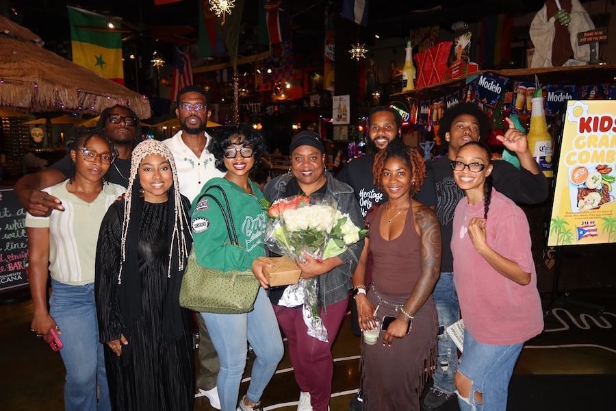 Jennine Labuzan (center) is shown after her release from federal custody. (Courtesy of Fajr DeLane)